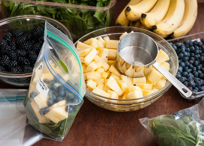 Add fresh or frozen fruit to frozen green smoothies